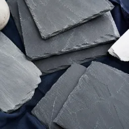 Natural gray slate roofing pieces showing varied texture